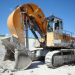 excavator-in-a-chalk-rock-quarry-mining-industry-2023-11-27-05-15-49-utc